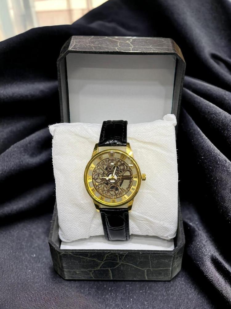 skeleton dial watch for men in leather strap